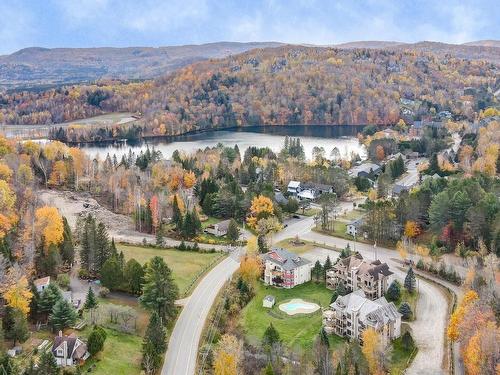 Photo aÃ©rienne - 2-107 Ch. De L'Érablière, Mont-Tremblant, QC - Outdoor With Body Of Water With View