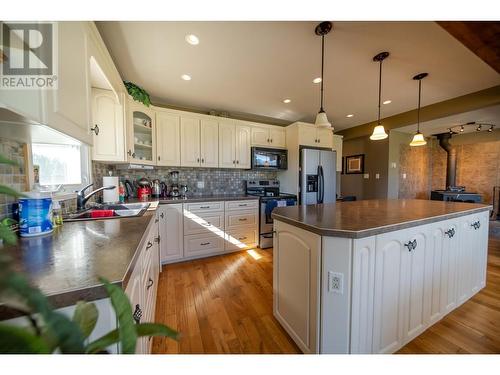 7055 93/95 Highway, Wasa, BC - Indoor Photo Showing Kitchen With Double Sink