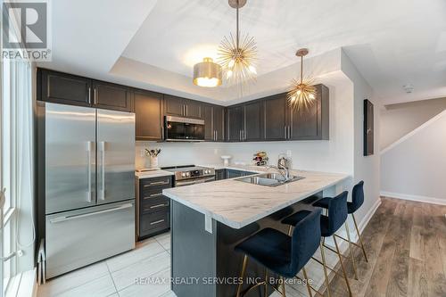 27 - 100 Dufay Road, Brampton, ON - Indoor Photo Showing Kitchen With Double Sink