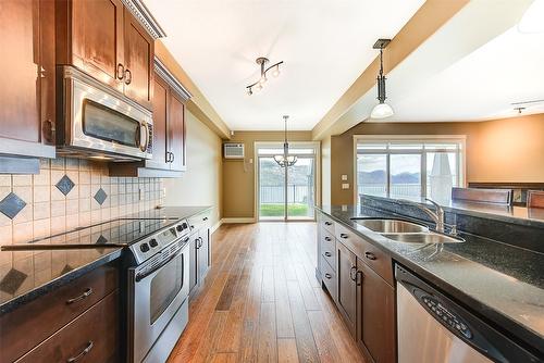 108-4350 Ponderosa Drive, Peachland, BC - Indoor Photo Showing Kitchen With Stainless Steel Kitchen With Double Sink With Upgraded Kitchen