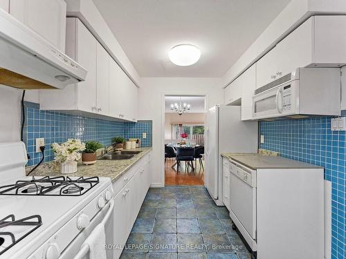 16-20 Hainford St, Toronto, ON - Indoor Photo Showing Kitchen With Double Sink