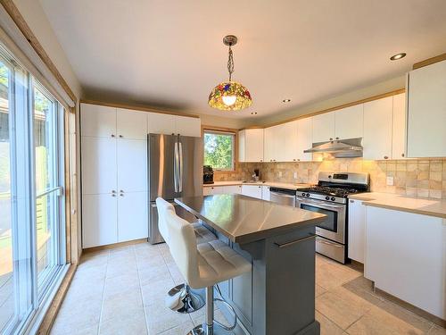 Kitchen - 148 Rue Des Trembles, Sainte-Marguerite-Du-Lac-Masson, QC 