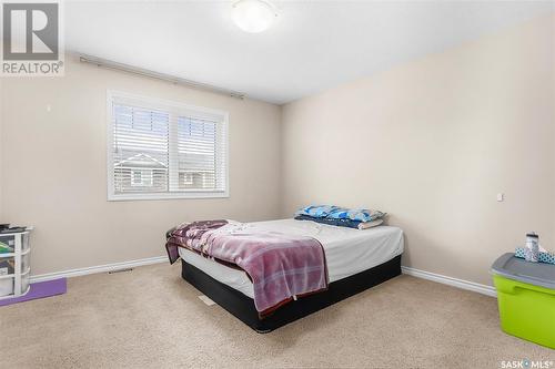 4 115 Veltkamp Crescent, Saskatoon, SK - Indoor Photo Showing Bedroom