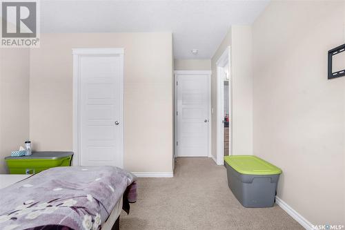 4 115 Veltkamp Crescent, Saskatoon, SK - Indoor Photo Showing Bedroom