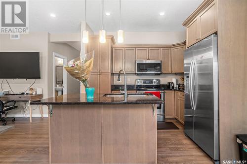 4 115 Veltkamp Crescent, Saskatoon, SK - Indoor Photo Showing Kitchen With Stainless Steel Kitchen With Upgraded Kitchen