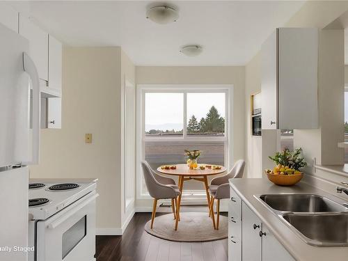 404-445 Cook St, Victoria, BC - Indoor Photo Showing Kitchen With Double Sink