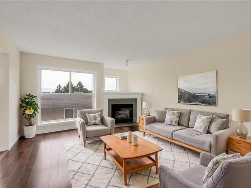 404-445 Cook St, Victoria, BC - Indoor Photo Showing Living Room With Fireplace