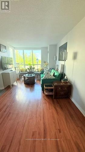 203 - 4889 Kimbermount Avenue N, Mississauga, ON - Indoor Photo Showing Living Room