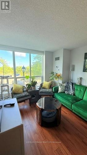 203 - 4889 Kimbermount Avenue N, Mississauga, ON - Indoor Photo Showing Living Room