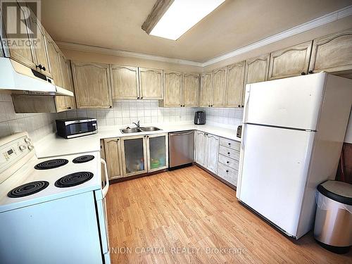 15 Sarah Crescent, Kawartha Lakes, ON - Indoor Photo Showing Kitchen With Double Sink