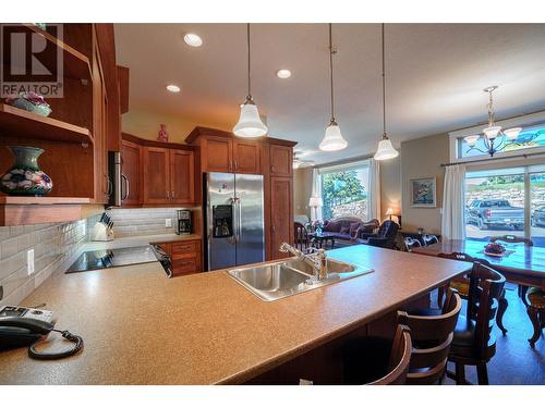 9100 Mackie Drive Unit# 101, Coldstream, BC - Indoor Photo Showing Kitchen With Double Sink