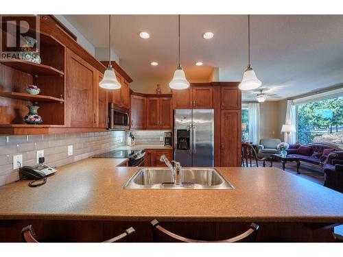 9100 Mackie Drive Unit# 101, Coldstream, BC - Indoor Photo Showing Kitchen With Double Sink