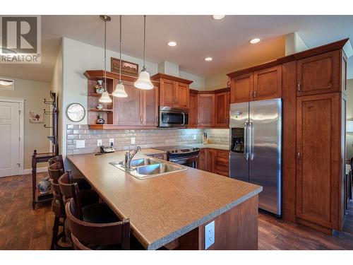 9100 Mackie Drive Unit# 101, Coldstream, BC - Indoor Photo Showing Kitchen With Double Sink With Upgraded Kitchen