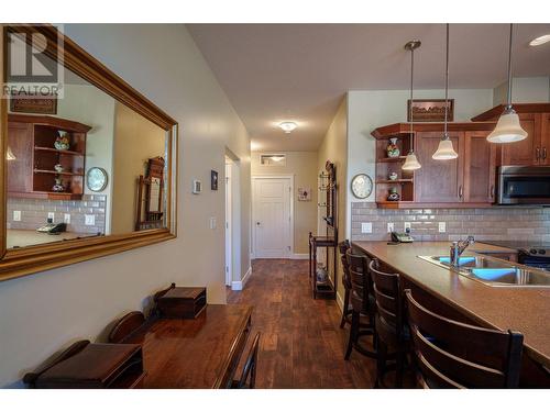 9100 Mackie Drive Unit# 101, Coldstream, BC - Indoor Photo Showing Kitchen With Double Sink