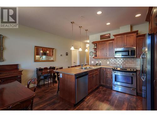 9100 Mackie Drive Unit# 101, Coldstream, BC - Indoor Photo Showing Kitchen With Double Sink