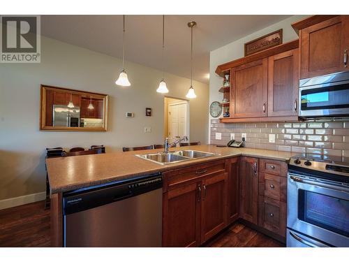 9100 Mackie Drive Unit# 101, Coldstream, BC - Indoor Photo Showing Kitchen With Double Sink