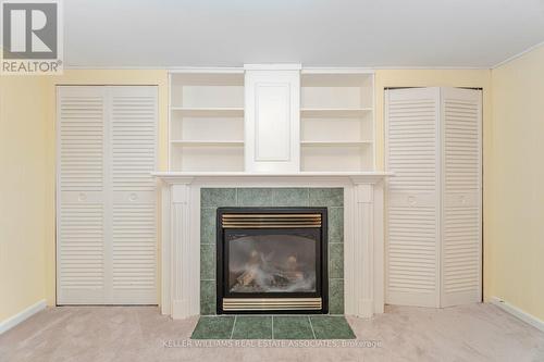 11 Dittmer Crescent, Toronto, ON - Indoor Photo Showing Living Room With Fireplace