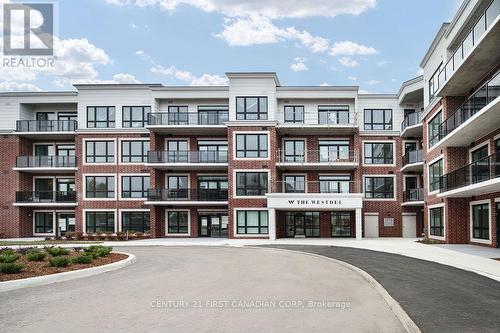 The Westdel Condominiums - 308 - 1975 Fountain Grass Drive, London, ON - Outdoor With Balcony With Facade