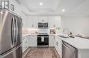 Kitchen with stainless steel appliances - 308 - 1975 Fountain Grass Drive, London, ON  - Indoor Photo Showing Kitchen With Double Sink With Upgraded Kitchen 