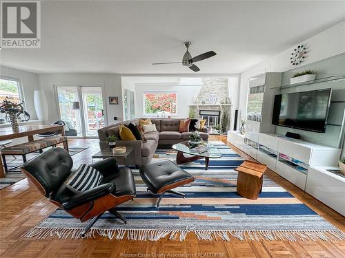 8235 Riverside Drive East, Windsor, ON - Indoor Photo Showing Living Room With Fireplace