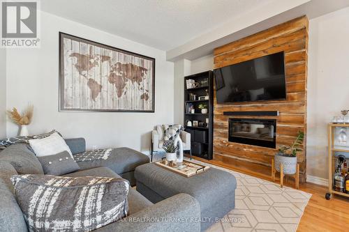 11 Blackpool Lane, East Gwillimbury, ON - Indoor Photo Showing Living Room With Fireplace