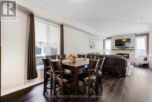 62 Vezna Crescent, Brampton, ON - Indoor Photo Showing Dining Room With Fireplace