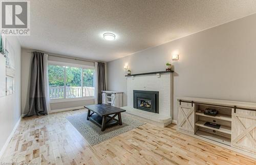 371 Strawberry Crescent, Waterloo, ON - Indoor Photo Showing Other Room With Fireplace