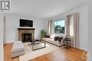 Virtually staged living room - 17 Westwood Drive, Ottawa, ON  - Indoor Photo Showing Living Room With Fireplace 