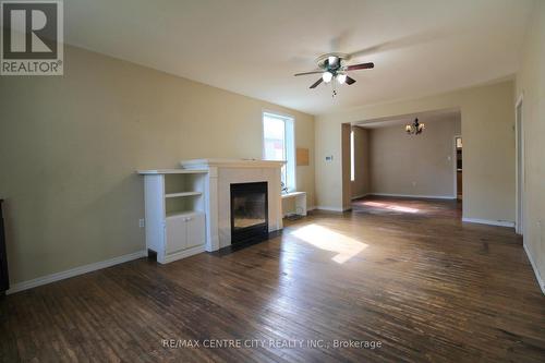 18 Woodworth Avenue, St. Thomas, ON - Indoor Photo Showing Living Room With Fireplace