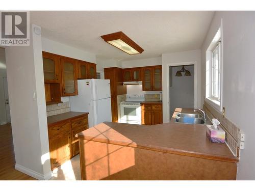 1240 Winnipeg Street, Smithers, BC - Indoor Photo Showing Kitchen With Double Sink