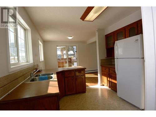 1240 Winnipeg Street, Smithers, BC - Indoor Photo Showing Kitchen With Double Sink