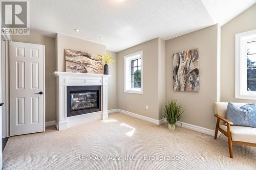 3061 Trulls Road, Clarington (Courtice), ON - Indoor Photo Showing Living Room With Fireplace