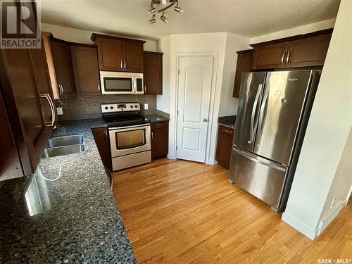 1540 G Avenue N, Saskatoon, SK - Indoor Photo Showing Kitchen With Stainless Steel Kitchen With Double Sink