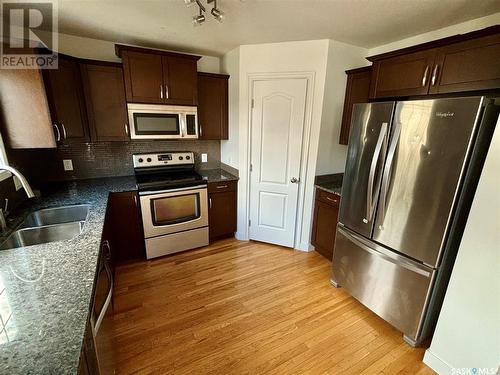 1540 G Avenue N, Saskatoon, SK - Indoor Photo Showing Kitchen With Stainless Steel Kitchen With Double Sink