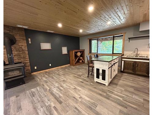 1006 Earl Street, Rossland, BC - Indoor With Fireplace