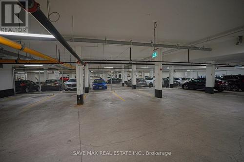 216 - 652 Cricklewood Drive, Mississauga, ON - Indoor Photo Showing Garage