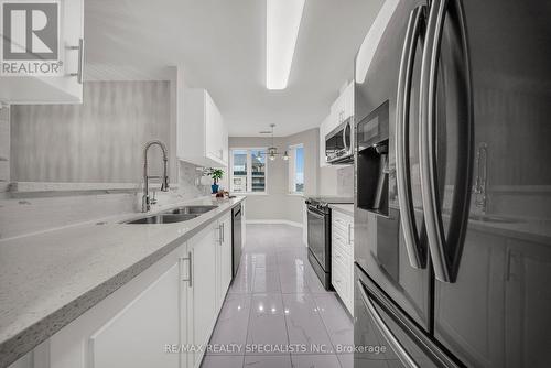 609 - 10 Dayspring Circle, Brampton, ON - Indoor Photo Showing Kitchen With Double Sink