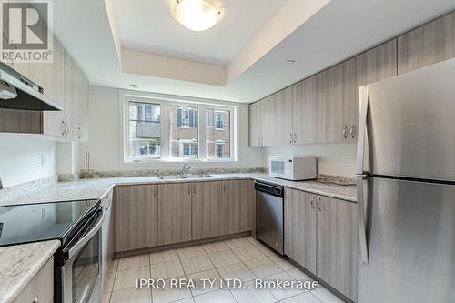 27 Filly Path, Oshawa, ON - Indoor Photo Showing Kitchen With Double Sink