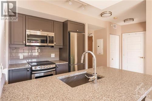 316 Bruyere Street Unit#217, Ottawa, ON - Indoor Photo Showing Kitchen With Double Sink With Upgraded Kitchen