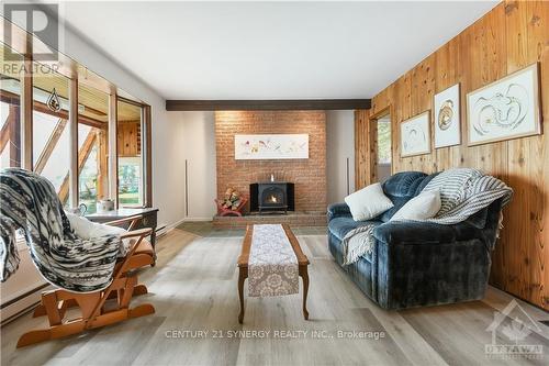 500 Ashdad Road, Greater Madawaska, ON - Indoor Photo Showing Living Room With Fireplace