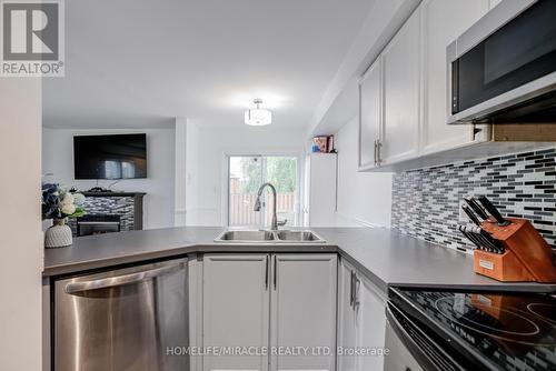 411 Woodmount Drive, Oshawa, ON - Indoor Photo Showing Kitchen With Double Sink