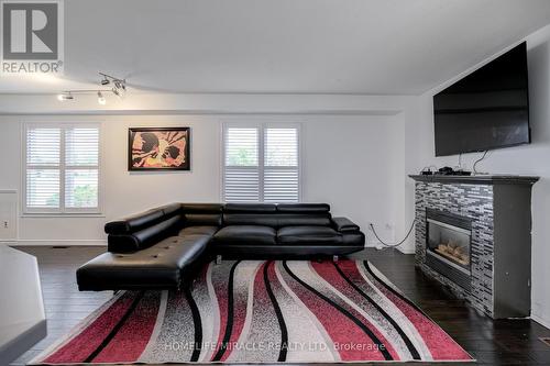 411 Woodmount Drive, Oshawa, ON - Indoor Photo Showing Living Room With Fireplace