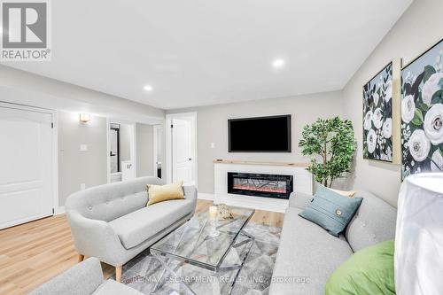 66 Howe Avenue, Hamilton, ON - Indoor Photo Showing Living Room With Fireplace