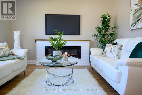 66 Howe Avenue, Hamilton, ON - Indoor Photo Showing Living Room With Fireplace