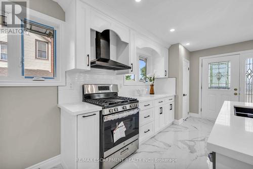 66 Howe Avenue, Hamilton, ON - Indoor Photo Showing Kitchen With Double Sink