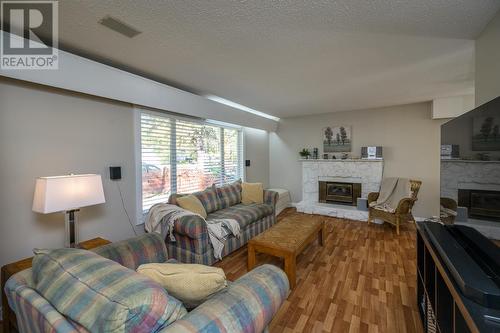 2734 Upland Street, Prince George, BC - Indoor Photo Showing Living Room With Fireplace