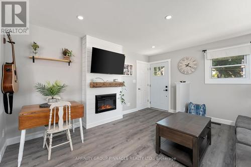 7 Church Street, Kawartha Lakes (Manilla), ON - Indoor Photo Showing Living Room With Fireplace