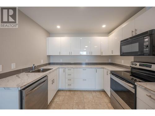 Basement Kitchen - 217 Greenwood Drive, Penticton, BC - Indoor Photo Showing Kitchen