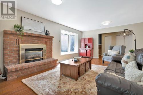 107 Willow Street, Brant, ON - Indoor Photo Showing Living Room With Fireplace