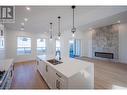 1125 Antler Drive, Penticton, BC  - Indoor Photo Showing Kitchen With Fireplace With Double Sink With Upgraded Kitchen 